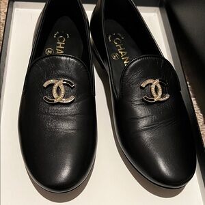 CHANEL Black Loafers with Gold Emblem